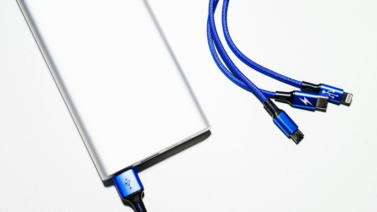 white power bank and blue coated wires