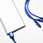 white power bank and blue coated wires