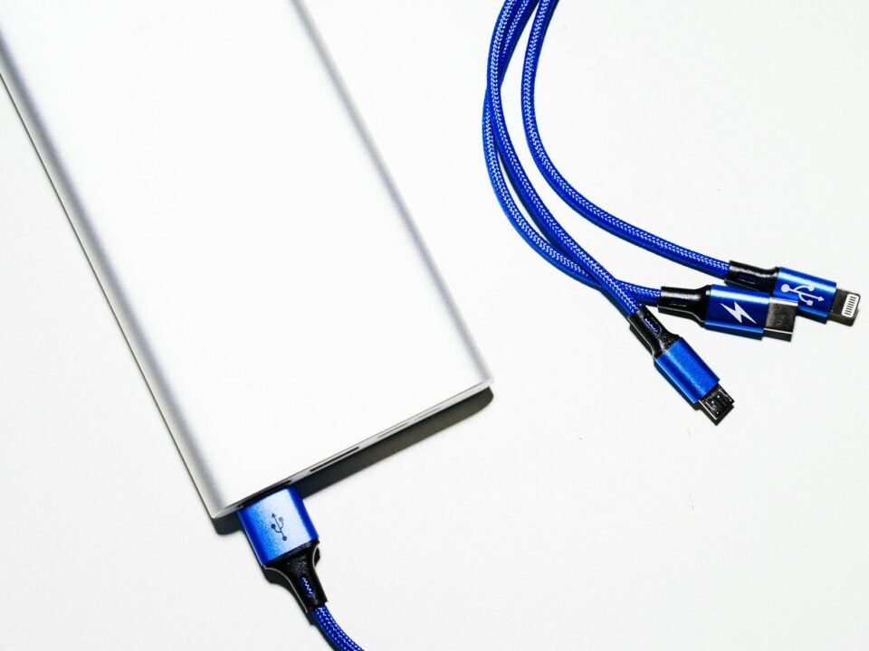 white power bank and blue coated wires